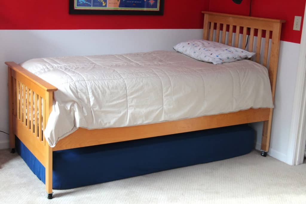 store extra mattress under bed